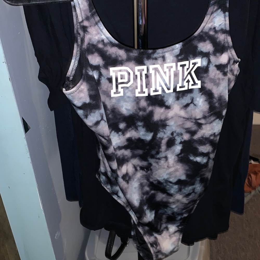 PINK swimsuit and purple cover-up swimming shorts